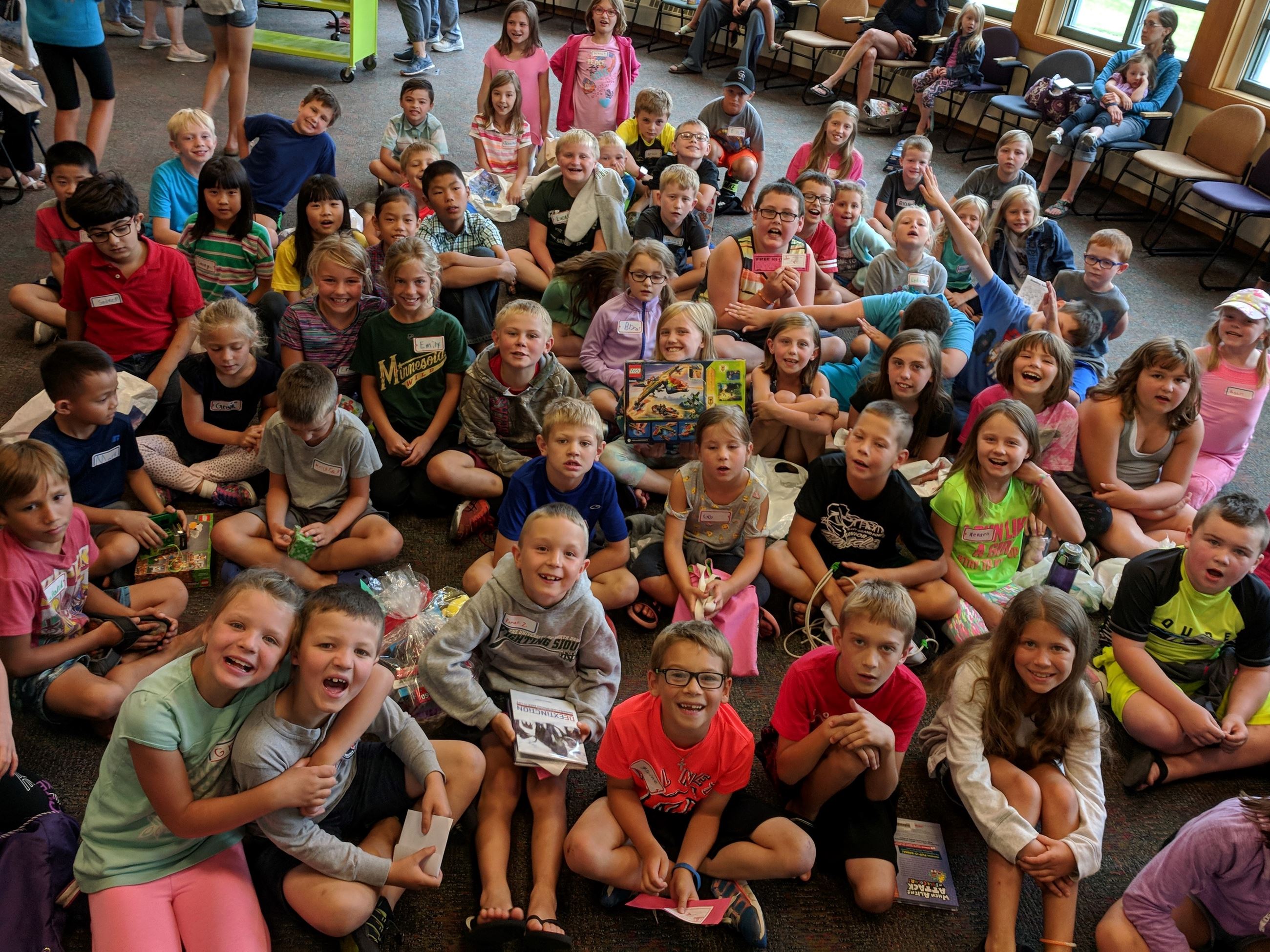 Large group of children in meeting room